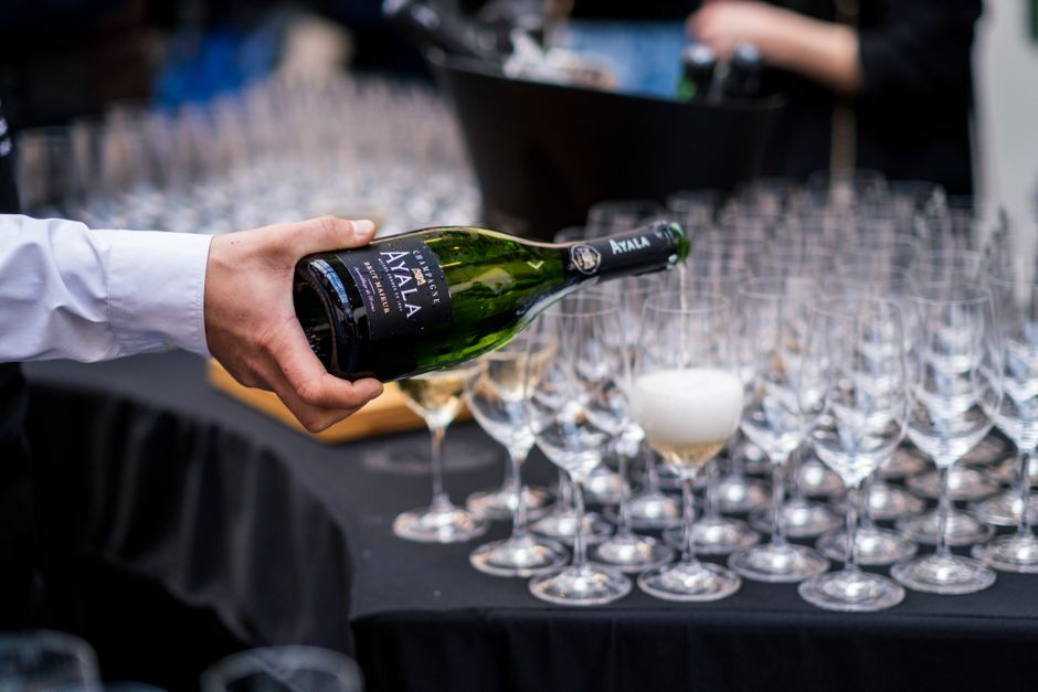 Bartender pouring champagne at an event